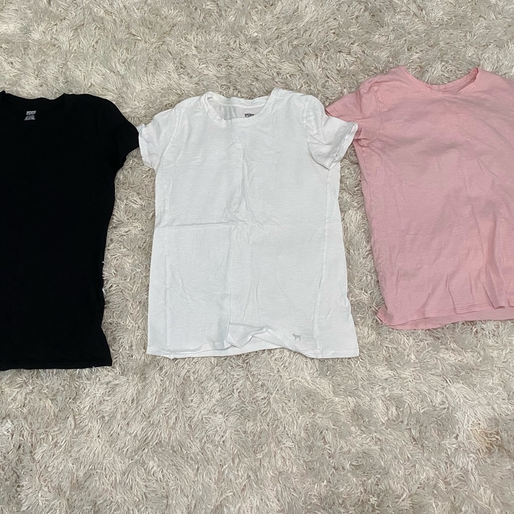 A bundle of three Victoria Secret Pink t-shirts